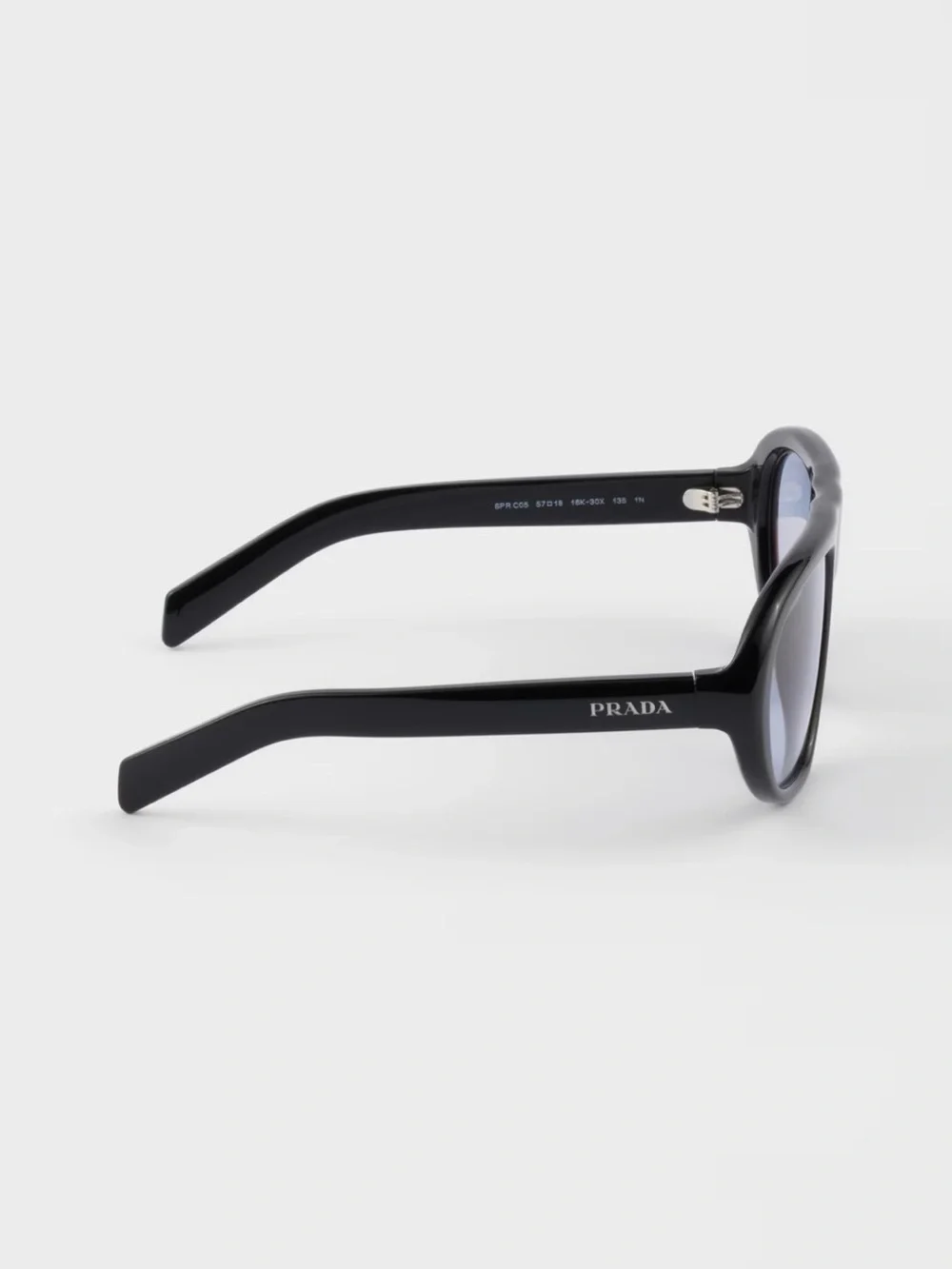 Prada Black Frame Sunglasses with Purple-Tinted Lenses